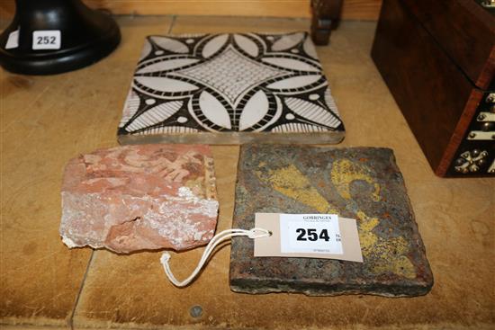 A Medieval encaustic tile, incomplete tile & later tile